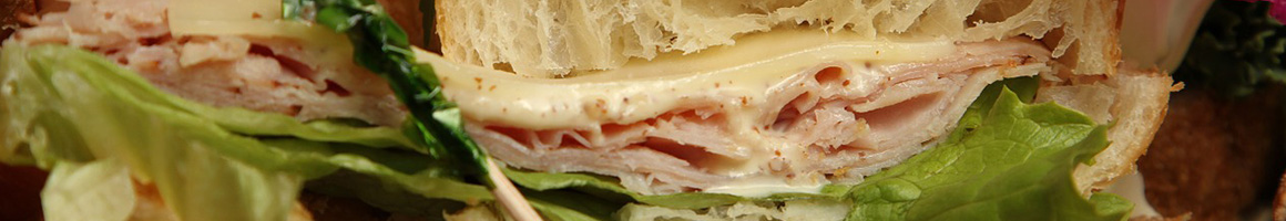Eating Deli Sandwich at Deli-Fresh restaurant in Charleston, WV.